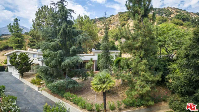a house view with a outdoor space