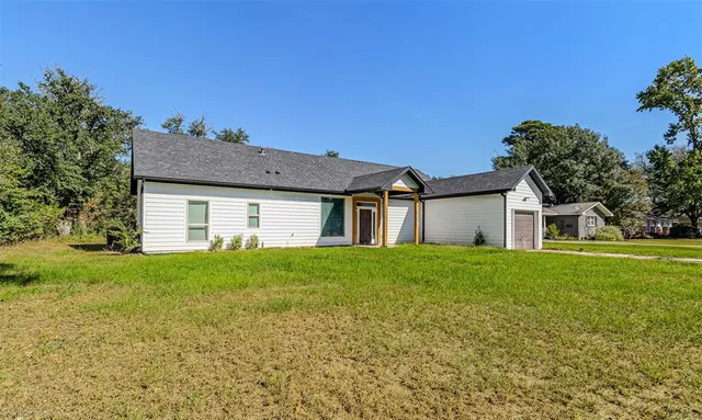 a house view with a garden space