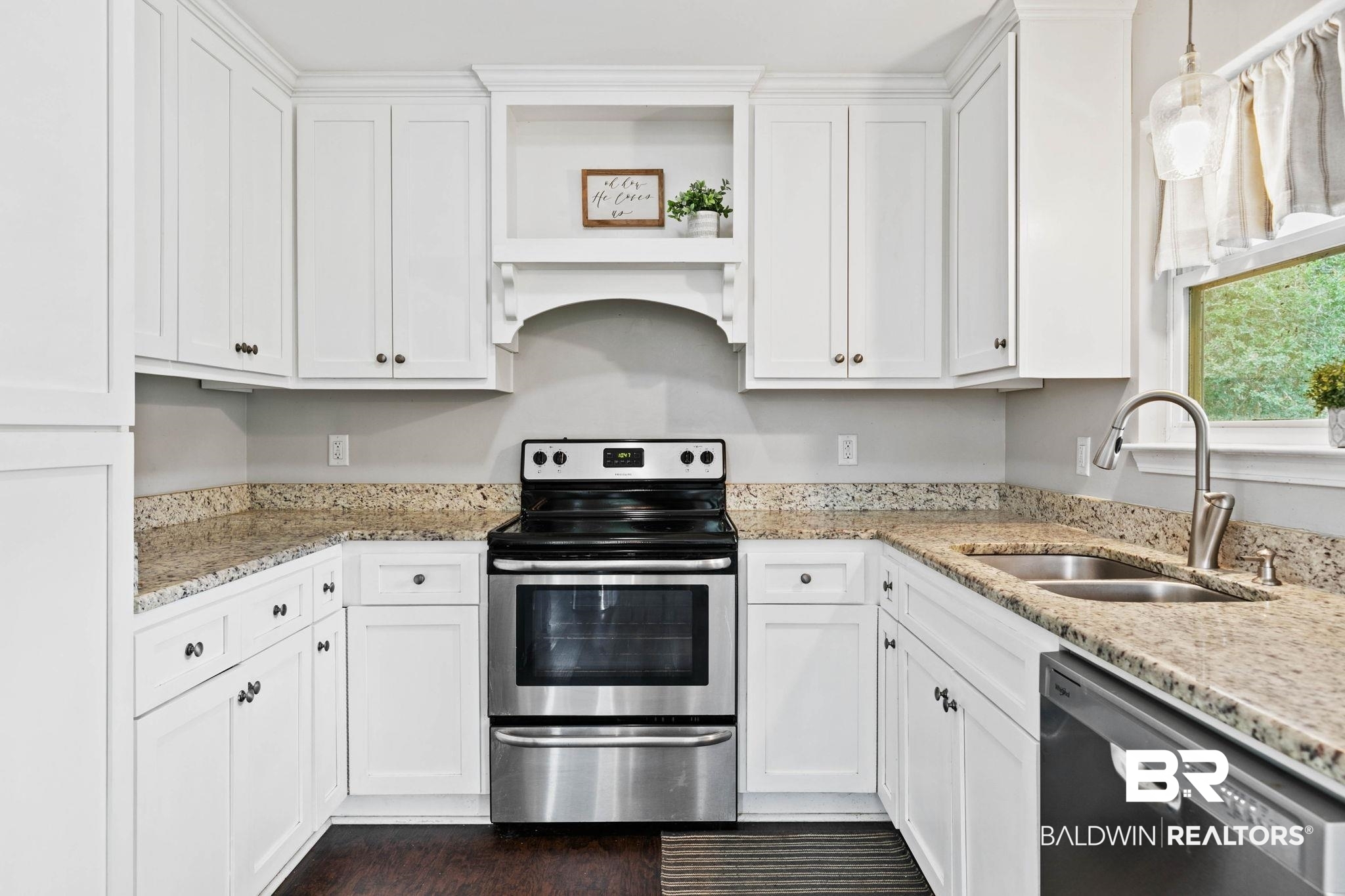 22810 High Ridge Road Fairhope, AL 36532 - Photo 27 of 78 Kitchen featuring white cabinetry, light-toned countertops, a stainless steel range, and a stainless steel sink with a gooseneck faucet