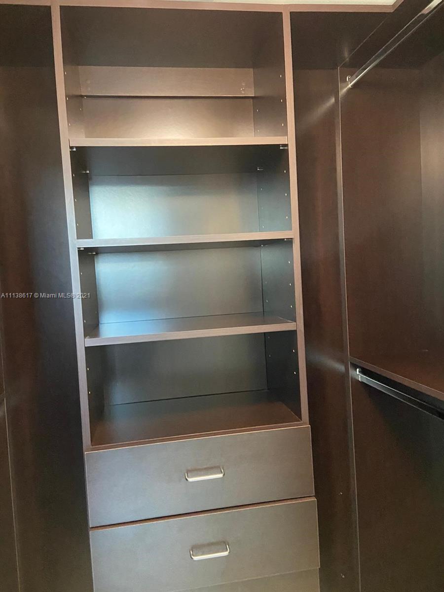 55 Southeast 6th Street, Unit 1903 Miami, FL 33131 - Photo 18 of 23 a close view of closet