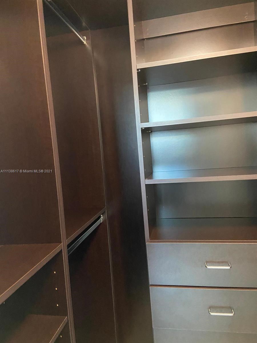 55 Southeast 6th Street, Unit 1903 Miami, FL 33131 - Photo 19 of 23 a close view of closet