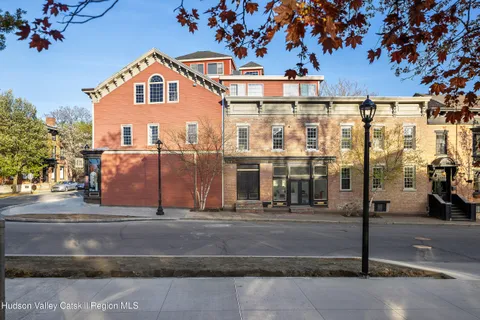 a front view of a building with street view
