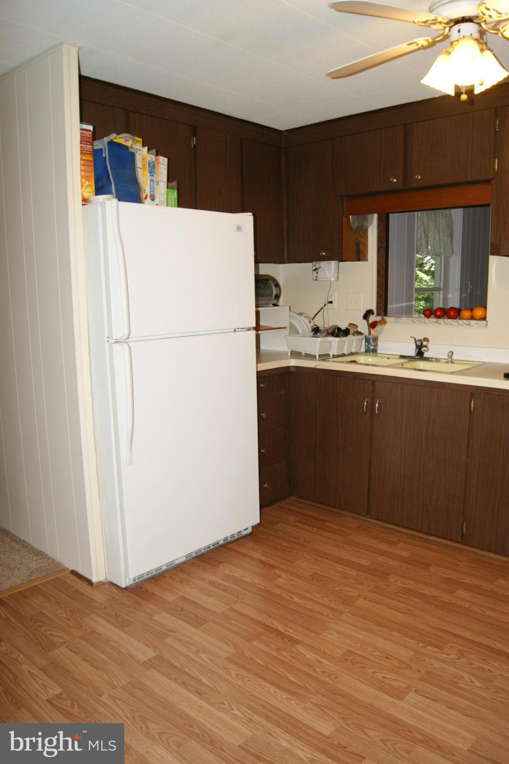 6805 Mackall Road St. Leonard, MD 20685 - Photo 24 of 30 a view of kitchen with wooden floor