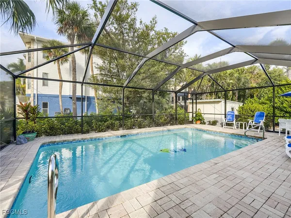 a view of indoor pool and sitting area