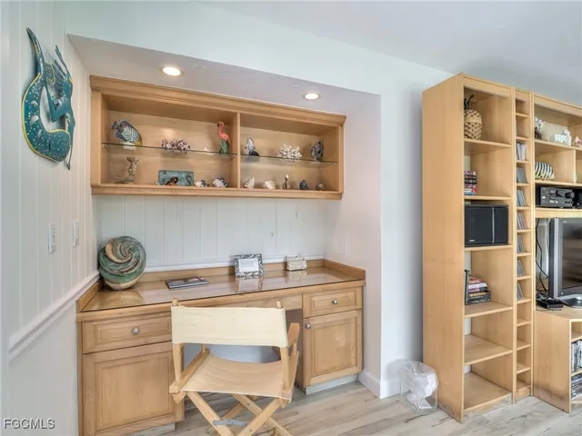 a view of a workspace with furniture