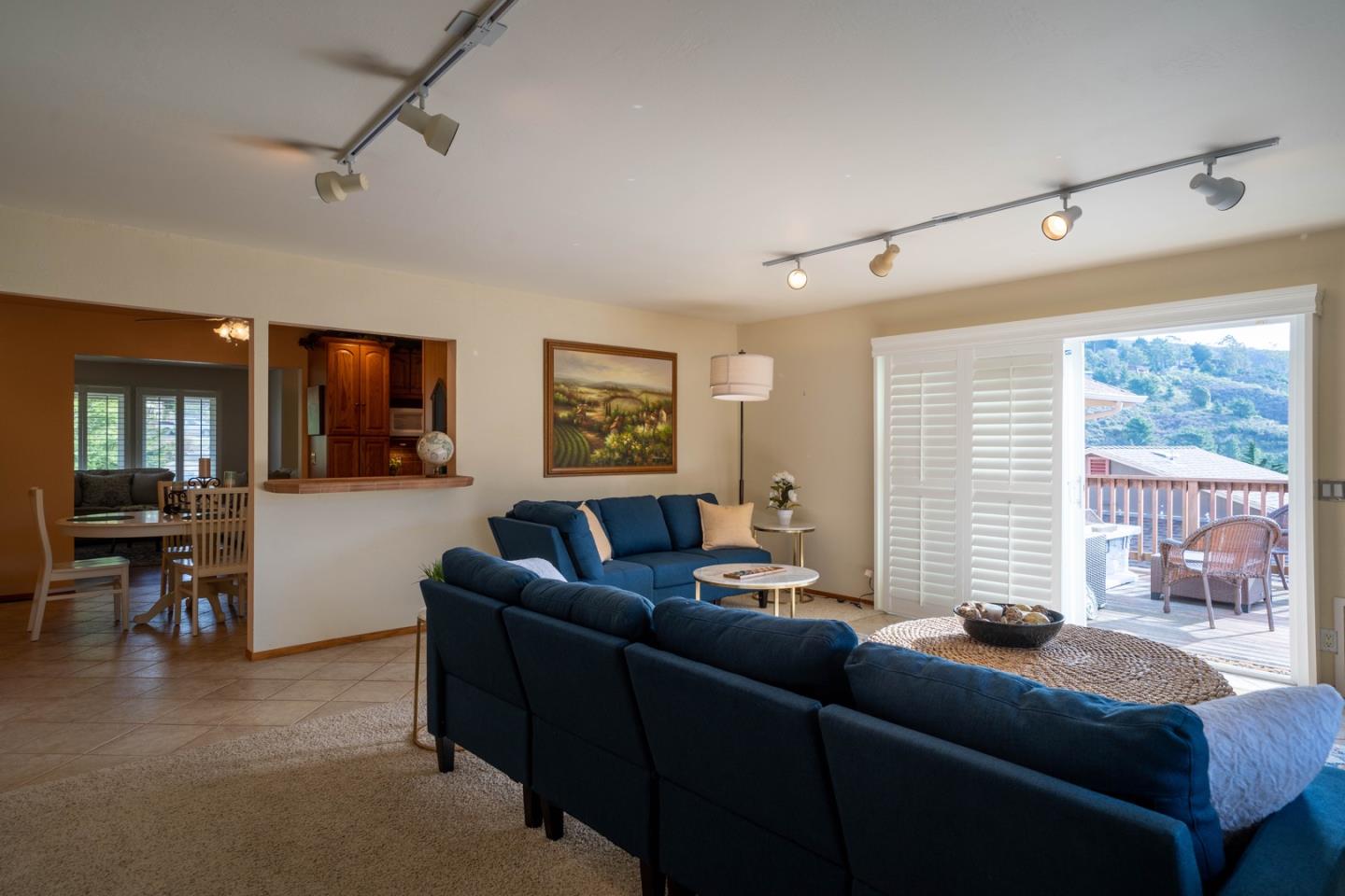 1067 Park Pacifica Avenue Pacifica, CA 94044 - Photo 14 of 25 a living room with furniture and a large window
