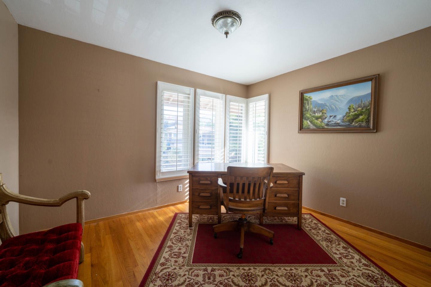 1067 Park Pacifica Avenue Pacifica, CA 94044 - Photo 18 of 25 a living room with furniture and a window