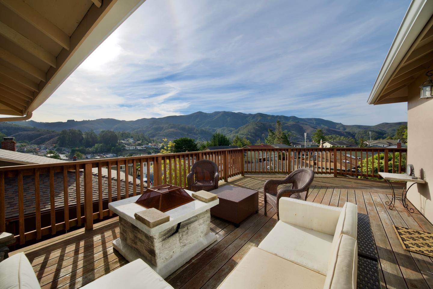 1067 Park Pacifica Avenue Pacifica, CA 94044 - Photo 20 of 25 a view of a roof deck with couches and wooden floor