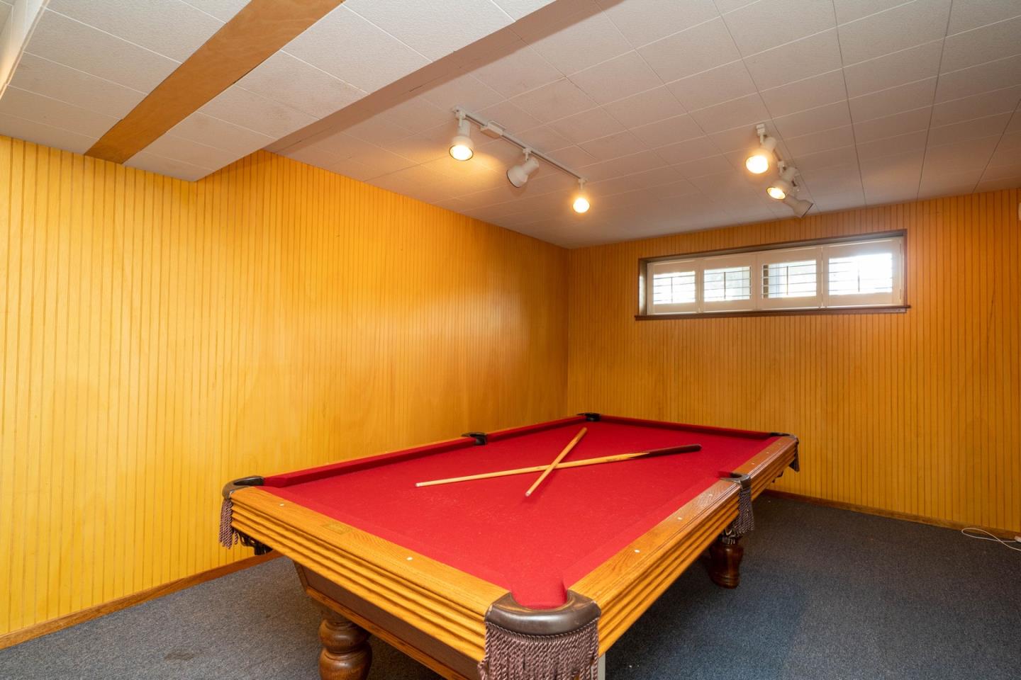 1067 Park Pacifica Avenue Pacifica, CA 94044 - Photo 23 of 25 a room with pool table and a window