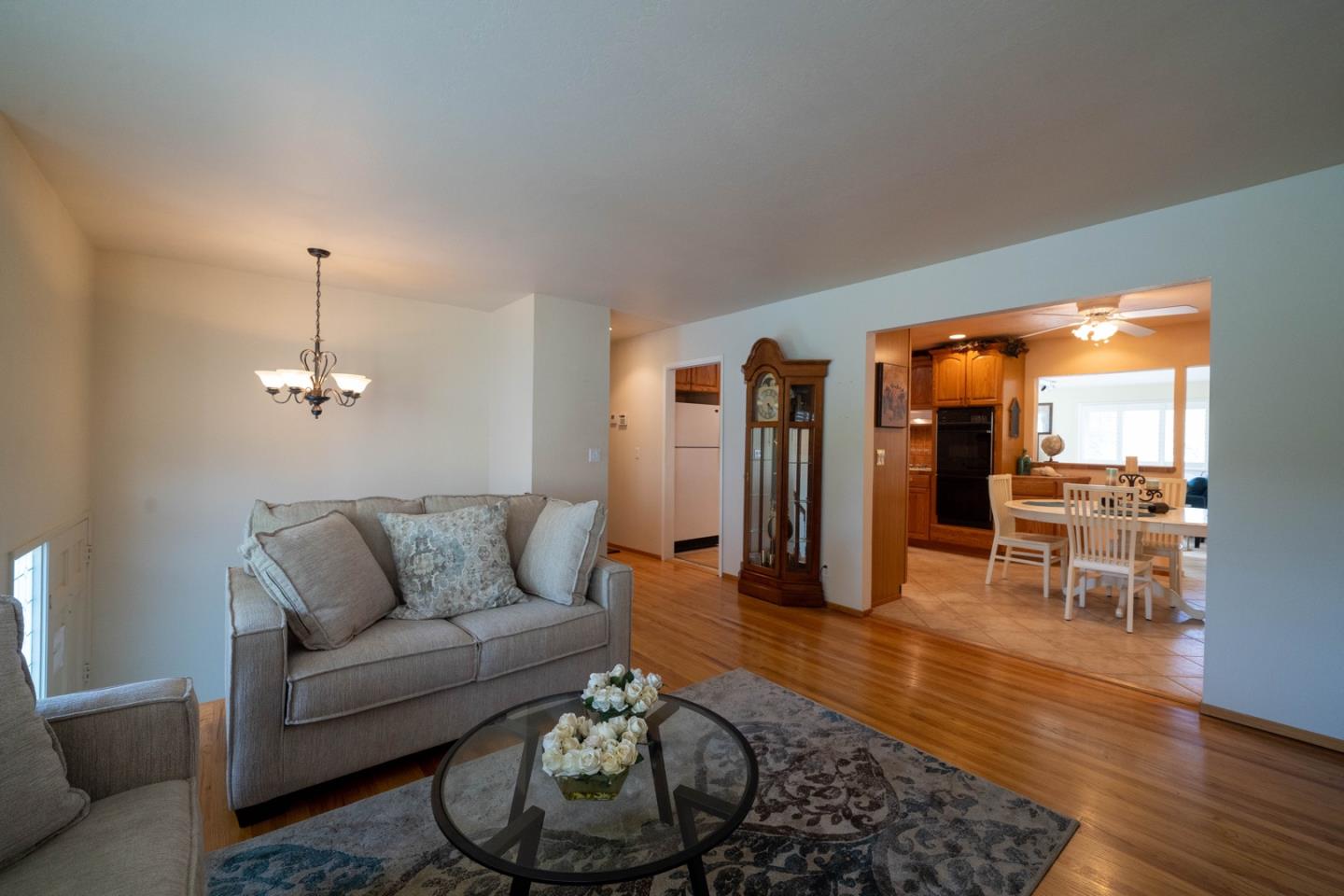 1067 Park Pacifica Avenue Pacifica, CA 94044 - Photo 6 of 25 a living room with furniture and wooden floor
