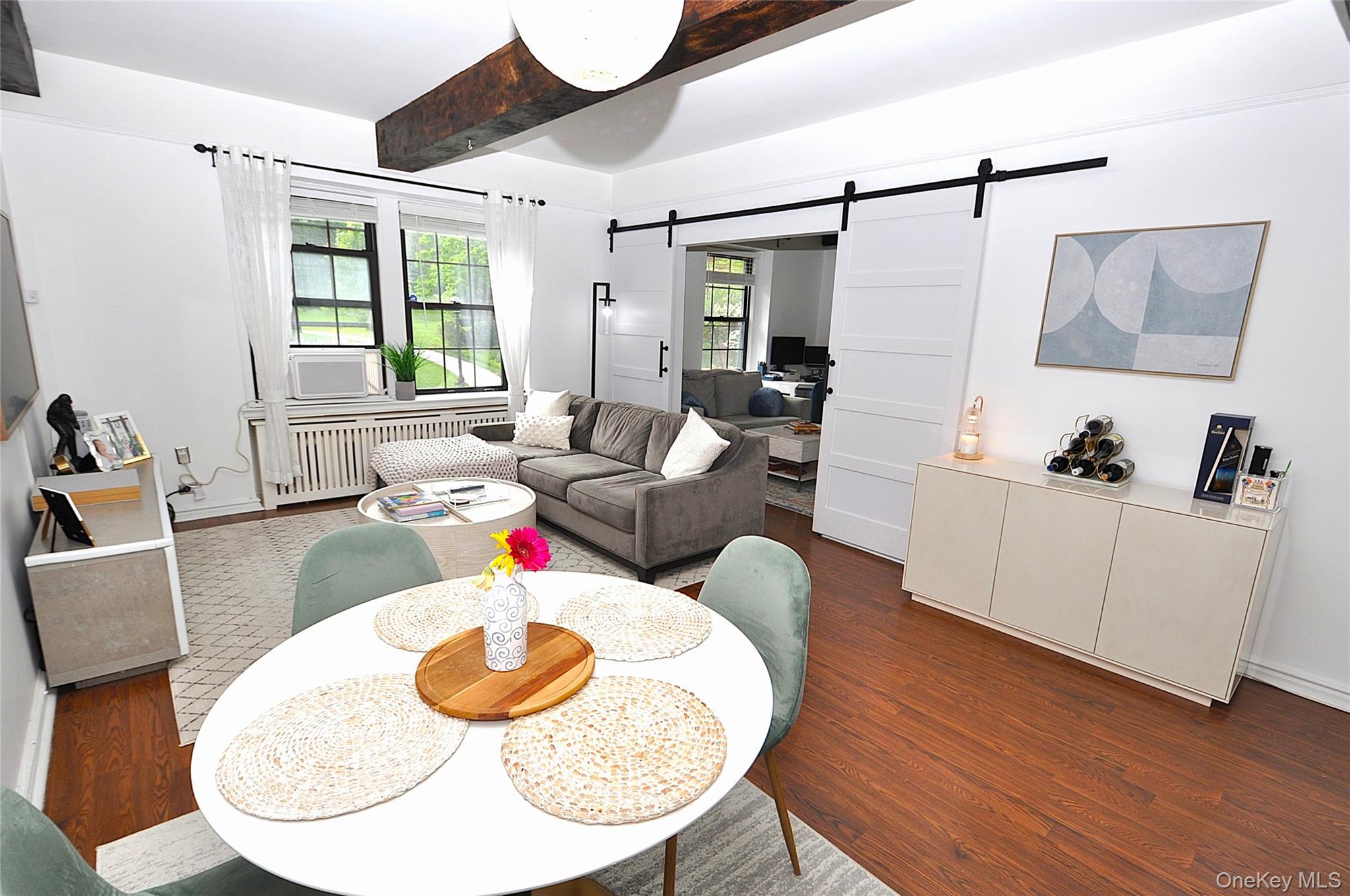 192 Garth Road, Unit TP Scarsdale, NY 10583 - Photo 1 of 43 Designed for both everyday living and effortless entertaining, the spacious living room flows seamlessly into a formal dining room that offers remarkable flexibility as a home office, den, or potential third bedroom.