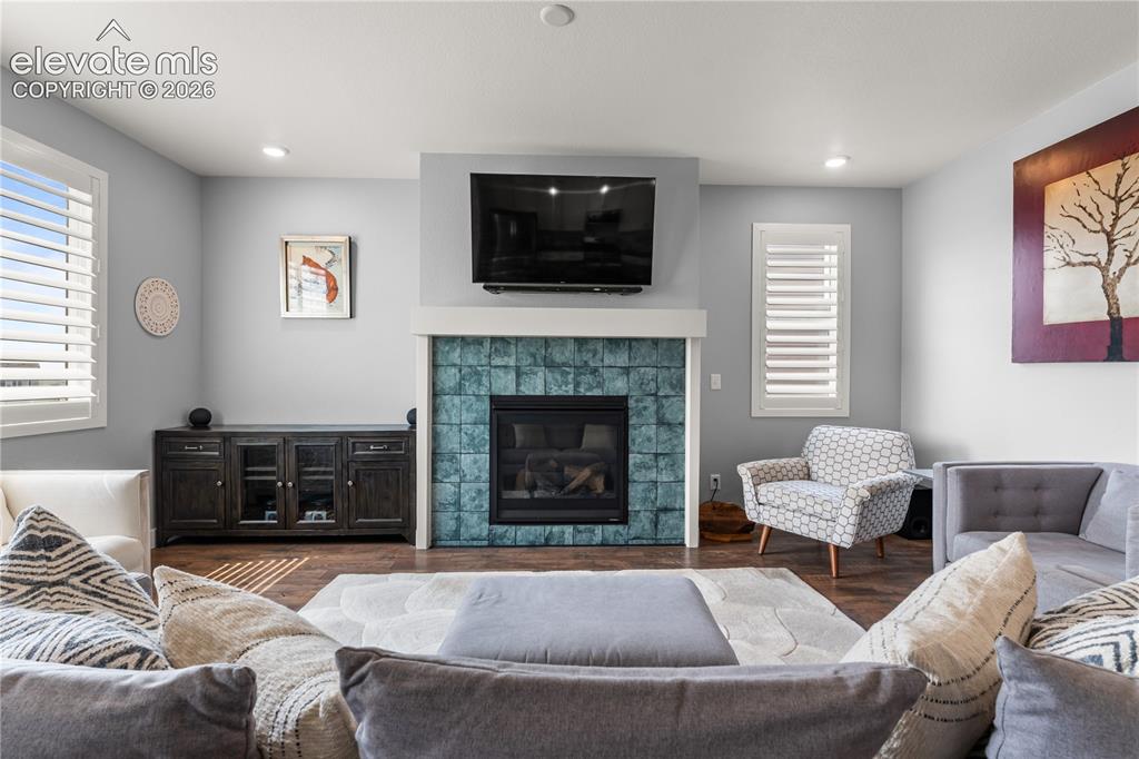 12781 Granite Ridge Drive Peyton, CO 80831 - Photo 10 of 41 The open Living and Dining Space is the perfect place to relax and entertain.
