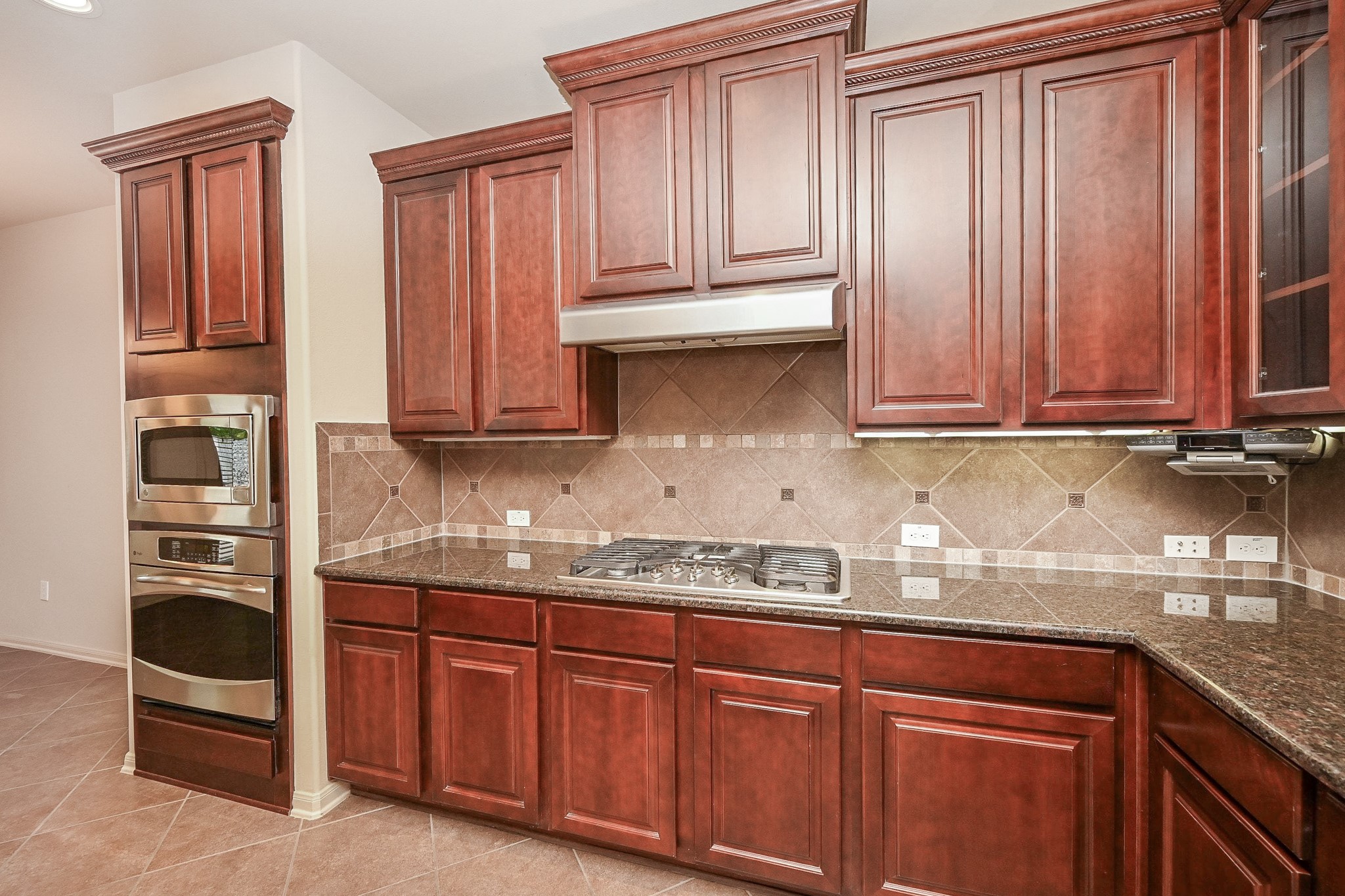 19 Sandwell Place Spring, TX 77389 - Photo 17 of 33 Kitchen with stainless steel appliances and ample cabinet and counter space