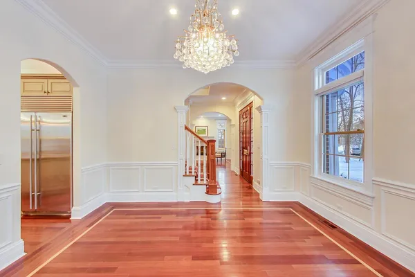 a kitchen with stainless steel appliances granite countertop a sink and cabinets