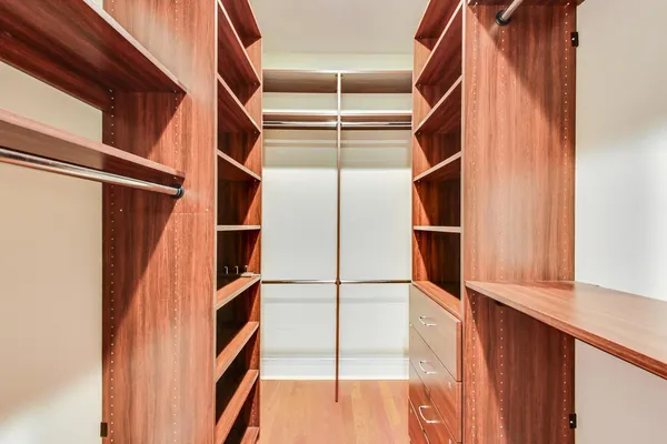 a spacious bedroom with a bed and a window