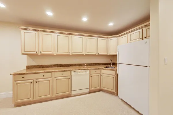 a front view of a house with a garage