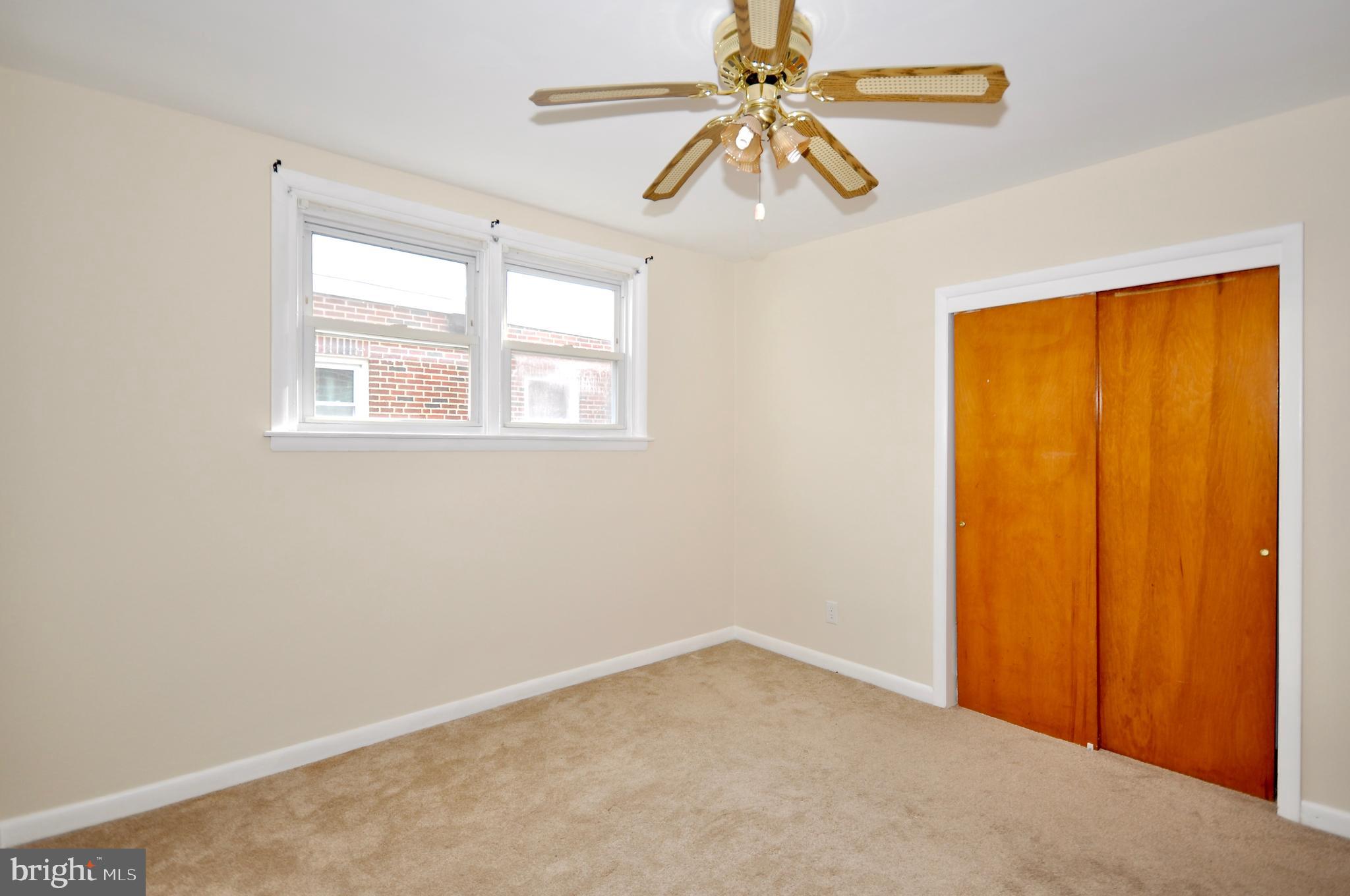 2216 Emerson Street Philadelphia, PA 19152 - Photo 22 of 31 an empty room with windows and fan