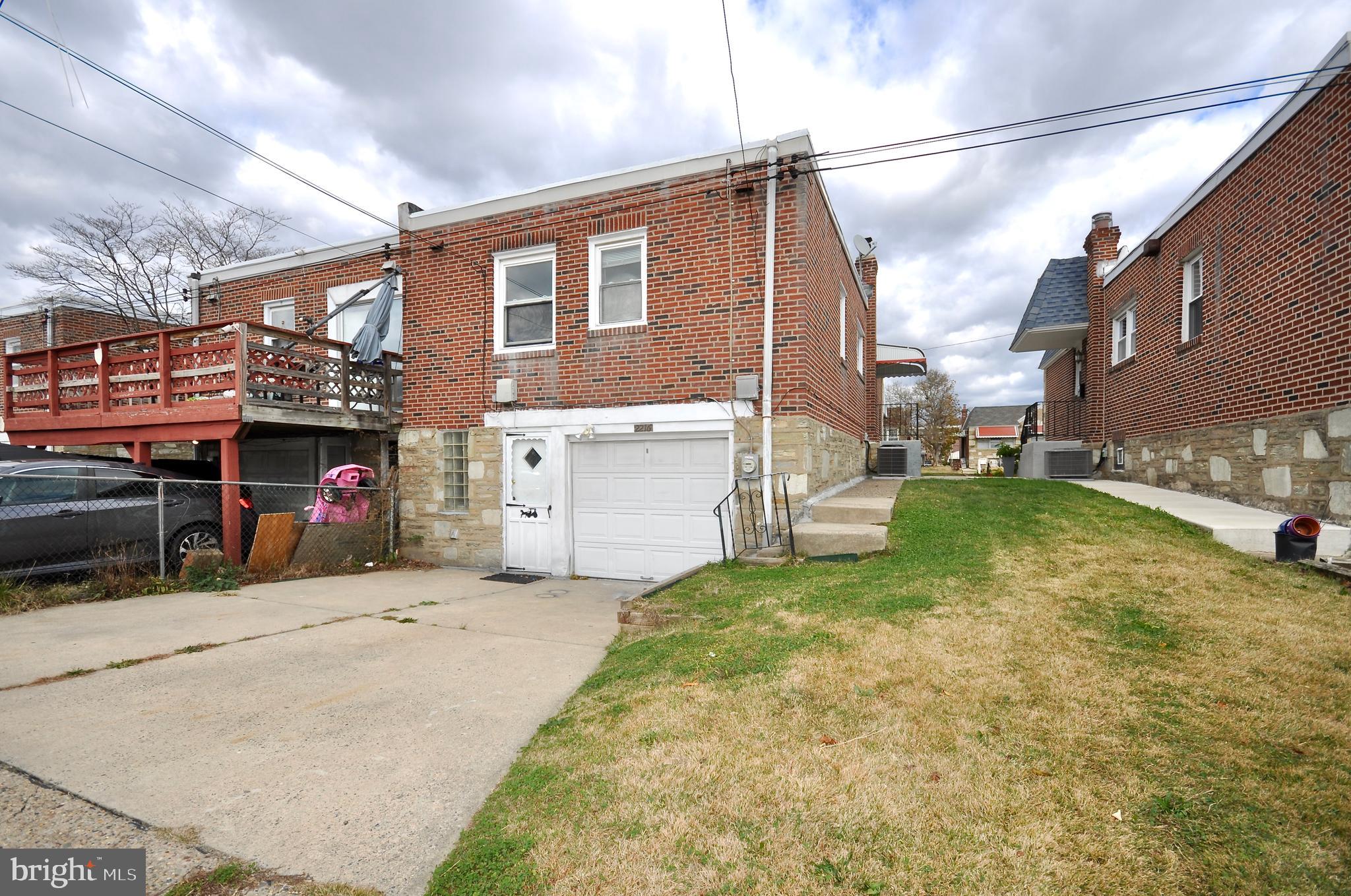 2216 Emerson Street Philadelphia, PA 19152 - Photo 29 of 31 a view of a house with a yard