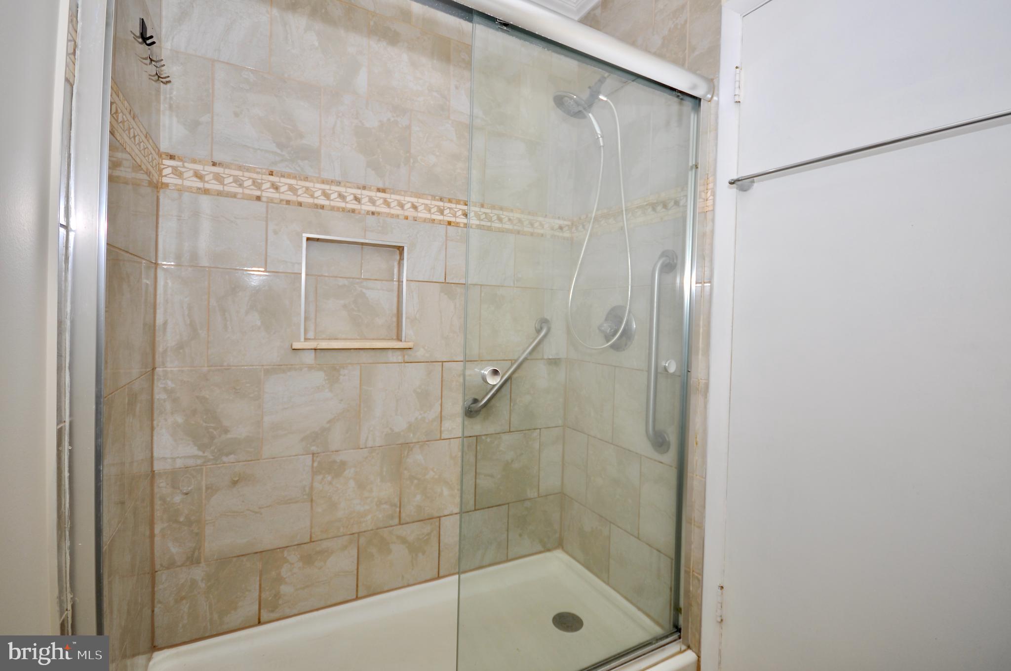 2216 Emerson Street Philadelphia, PA 19152 - Photo 3 of 31 a bathroom with a shower