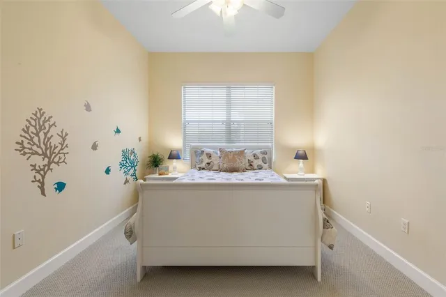 an aerial view of residential houses with outdoor space and river