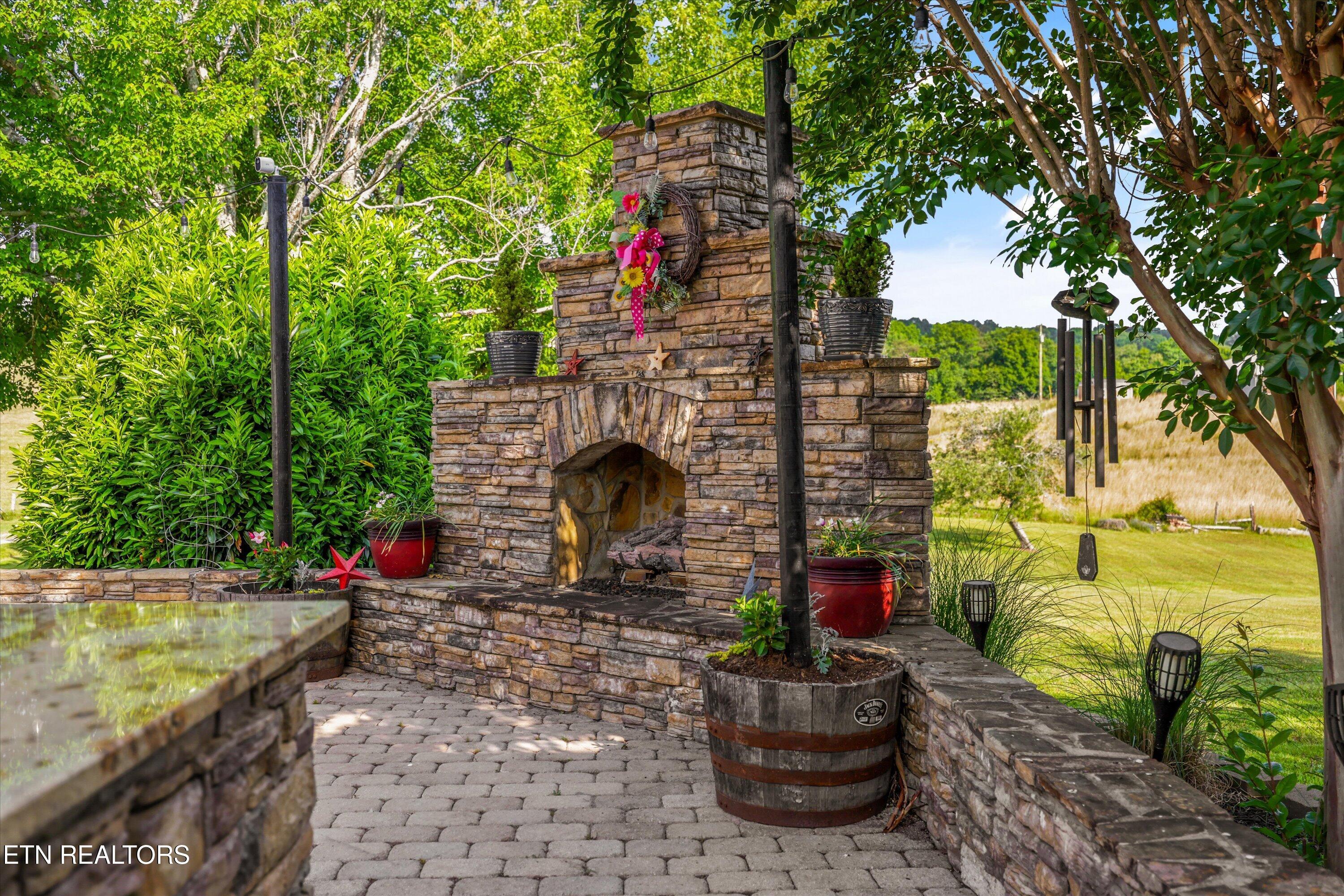 1167 Sable Road Spring City, TN 37381 - Photo 37 of 48 Outdoor Fireplace