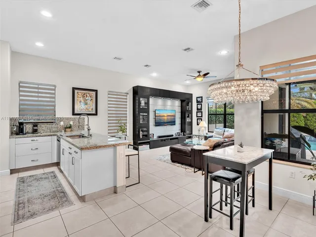 a view of a kitchen area with furniture and window