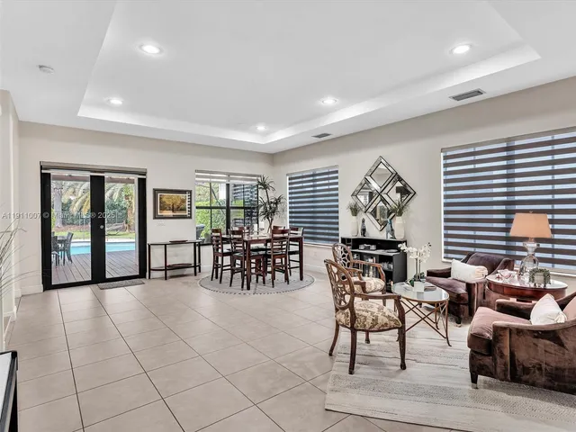 a view of a livingroom with furniture and window