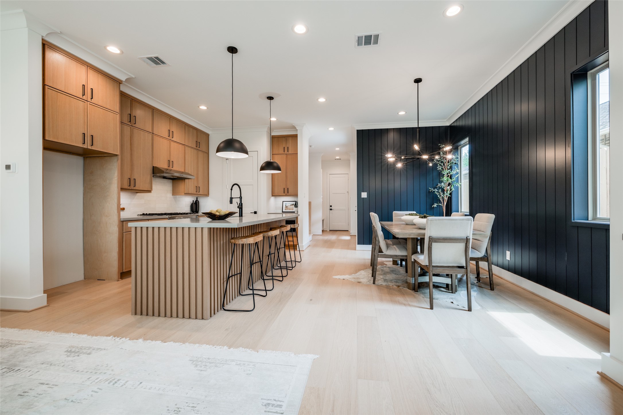 2327 Richton Street Houston, TX 77098 - Photo 20 of 47 a dining room with furniture and kitchen view