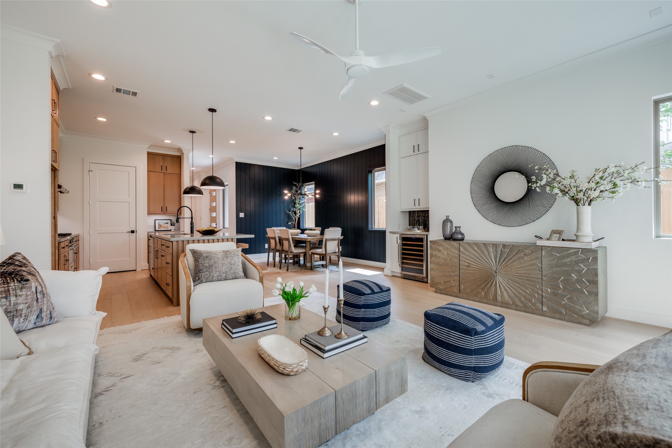 2327 Richton Street Houston, TX 77098 - Photo 22 of 47 a living room with furniture kitchen view and a large mirror