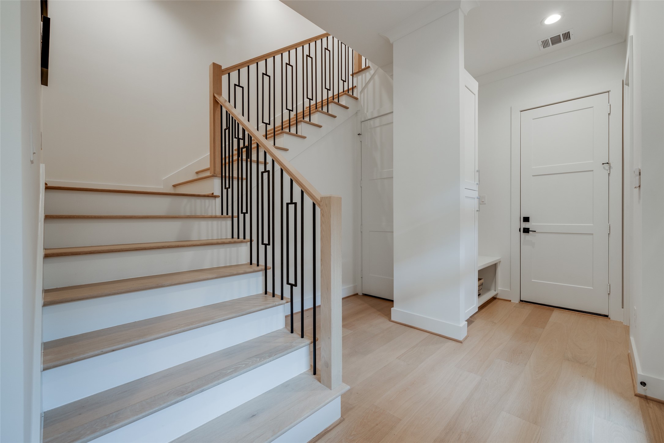 2327 Richton Street Houston, TX 77098 - Photo 27 of 47 a view of entryway with wooden floor