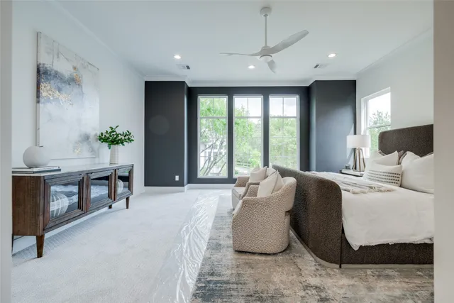 a bathroom with a double vanity sink mirror and bathtub