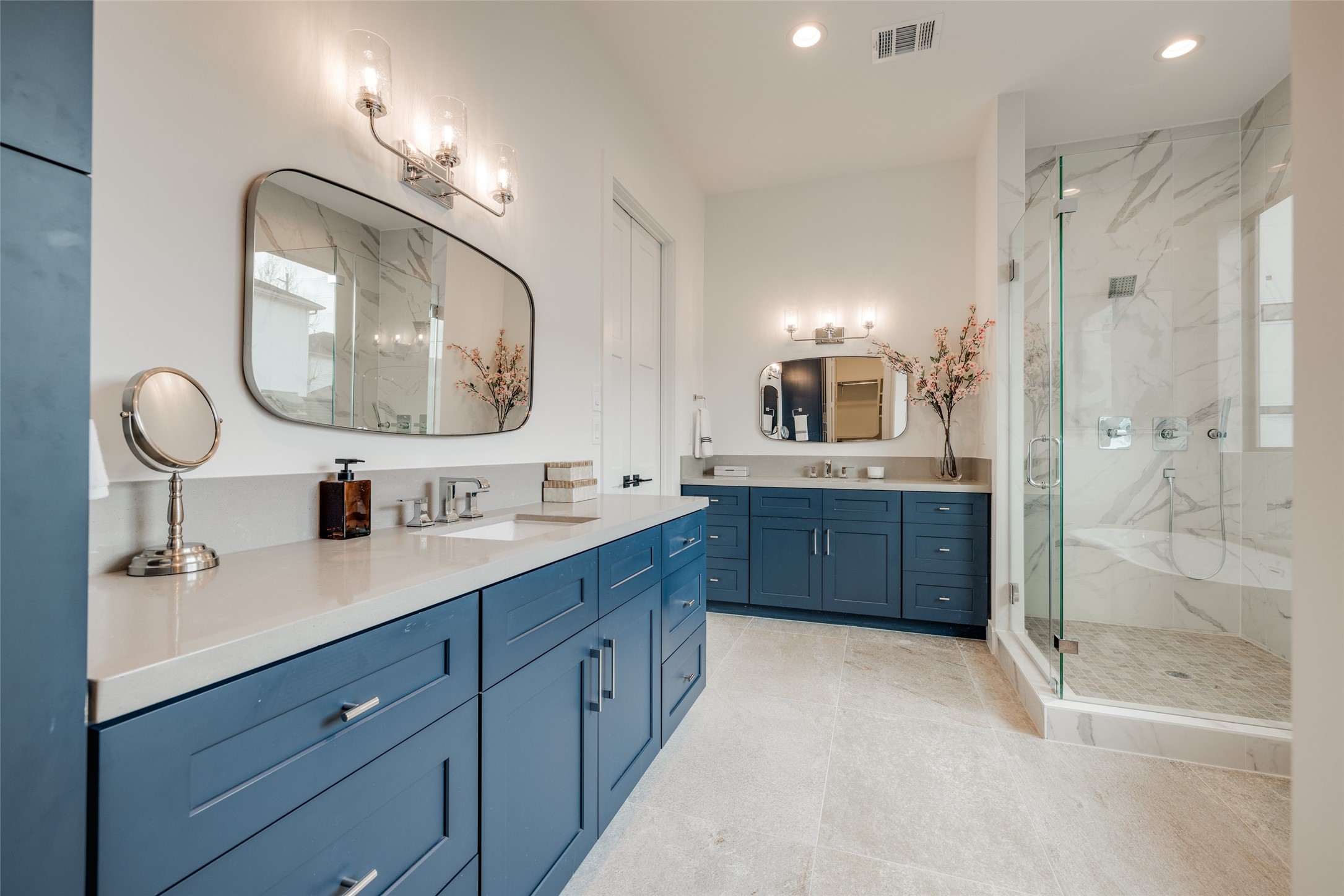 2327 Richton Street Houston, TX 77098 - Photo 33 of 47 a bathroom with a double vanity sink mirror and bathtub