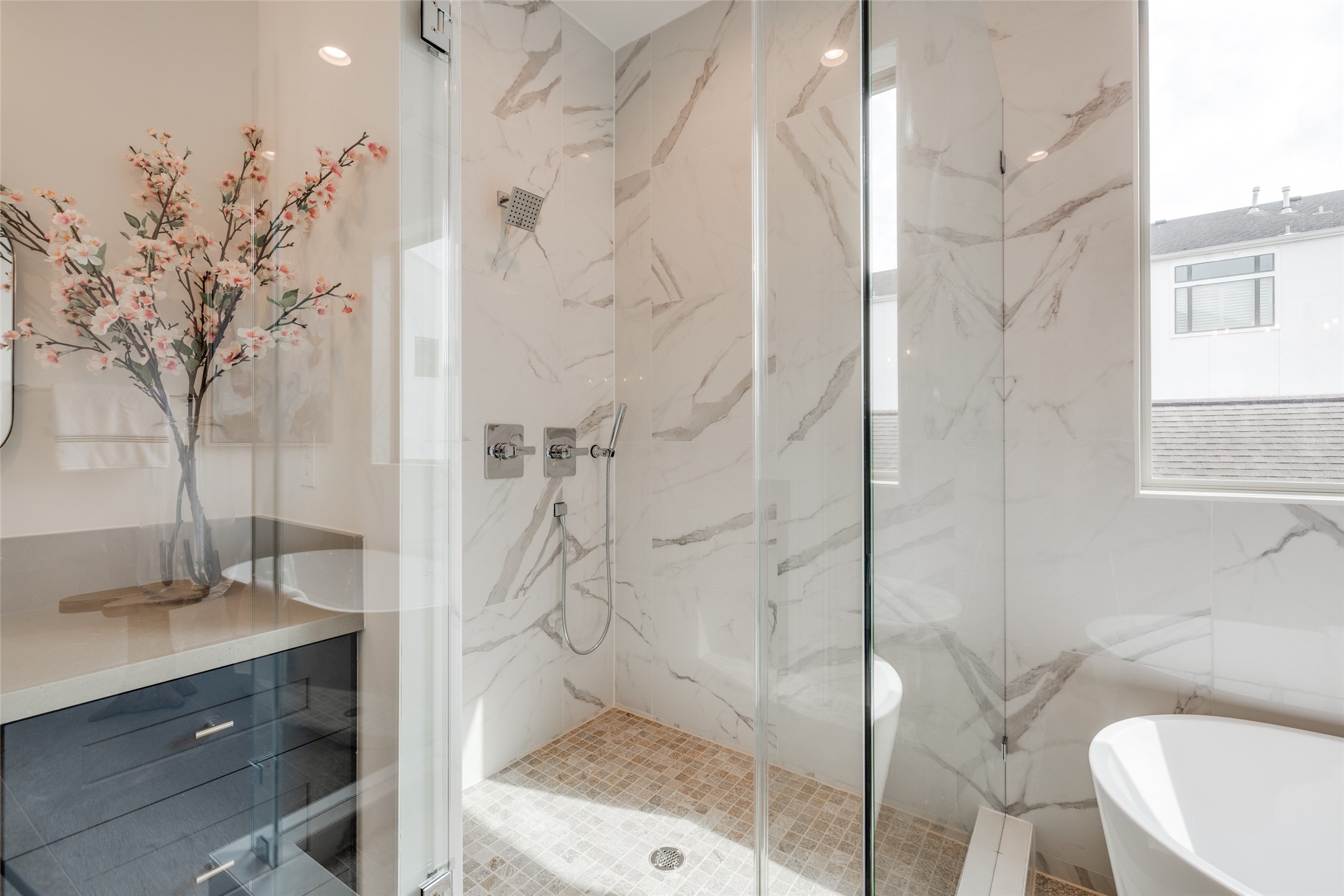 2327 Richton Street Houston, TX 77098 - Photo 35 of 47 a bathroom with a granite countertop sink a toilet and shower