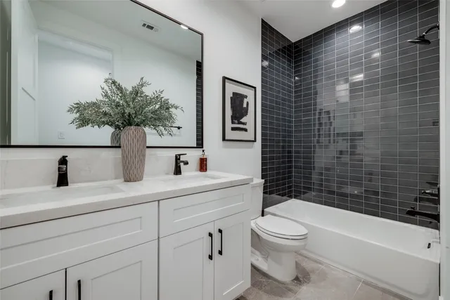 a kitchen with a sink a stove and cabinets