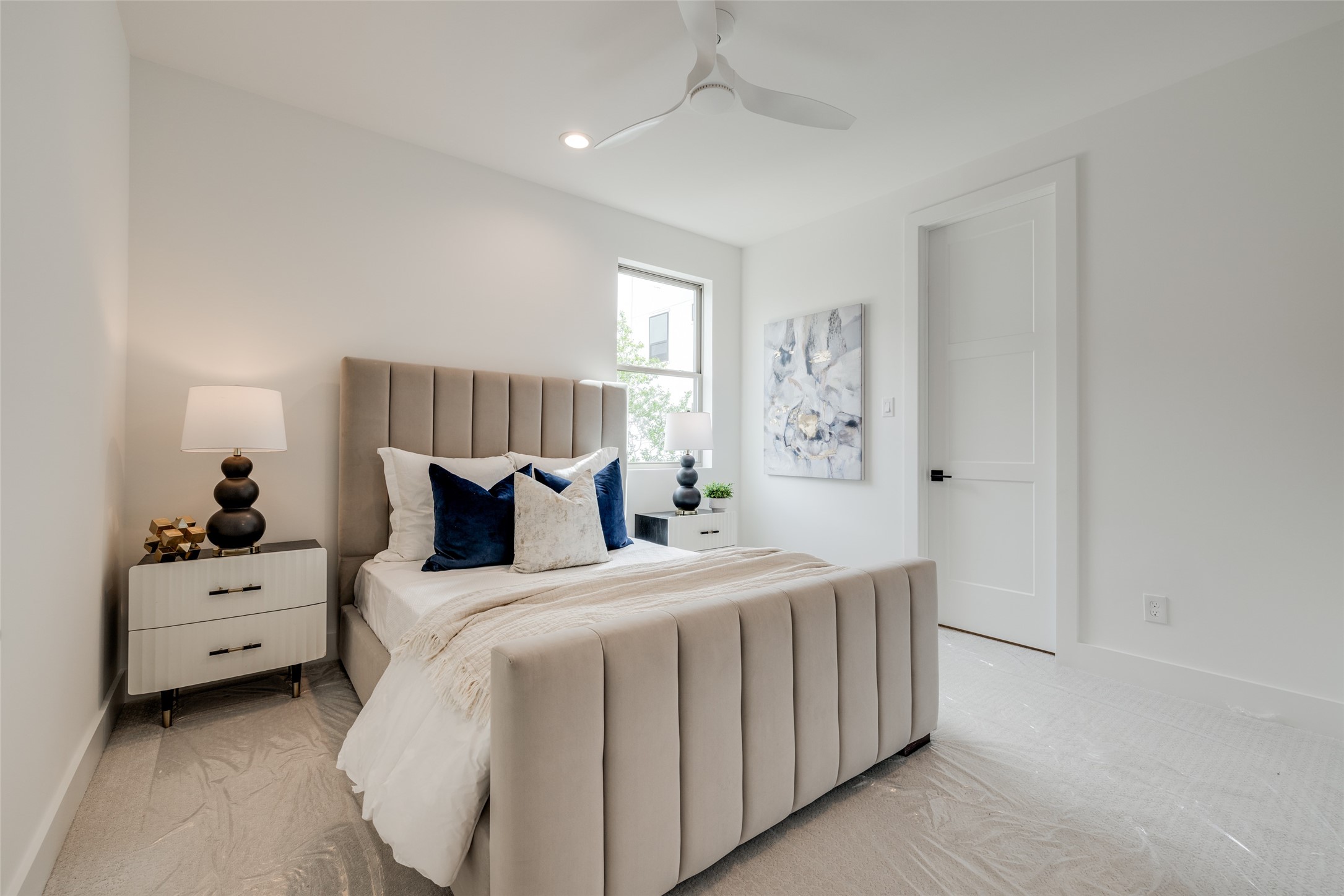 2327 Richton Street Houston, TX 77098 - Photo 39 of 47 a bedroom with a bed and a window