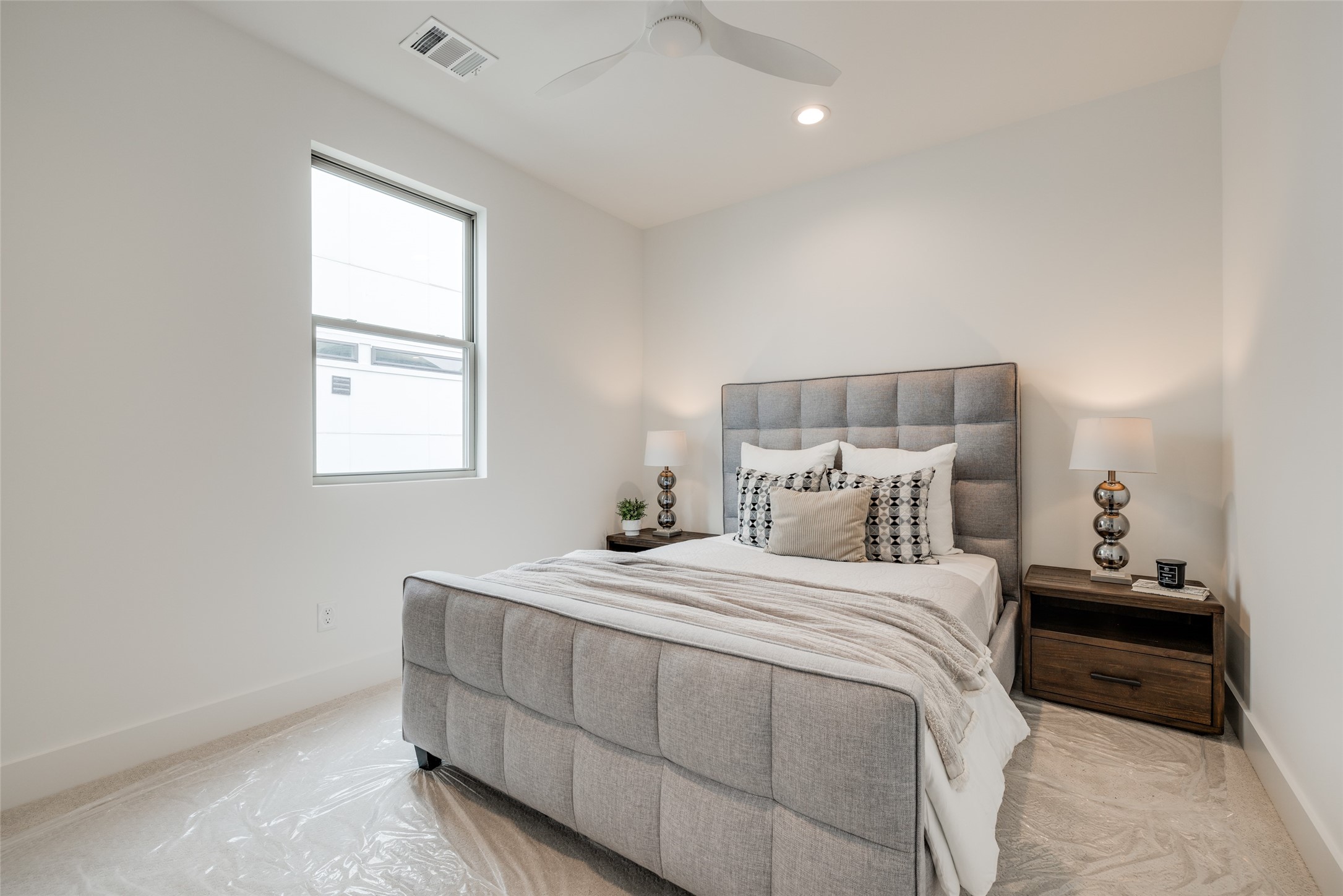 2327 Richton Street Houston, TX 77098 - Photo 41 of 47 a bedroom with a bed and a window