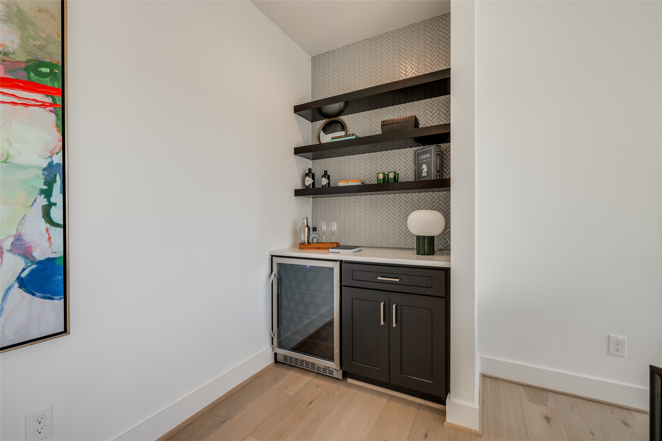 2327 Richton Street Houston, TX 77098 - Photo 43 of 47 a kitchen with a sink a stove and cabinets