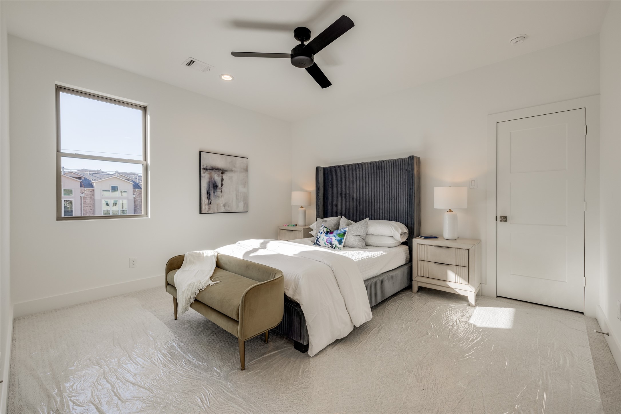 2327 Richton Street Houston, TX 77098 - Photo 44 of 47 a bed room with a bed and a chandelier