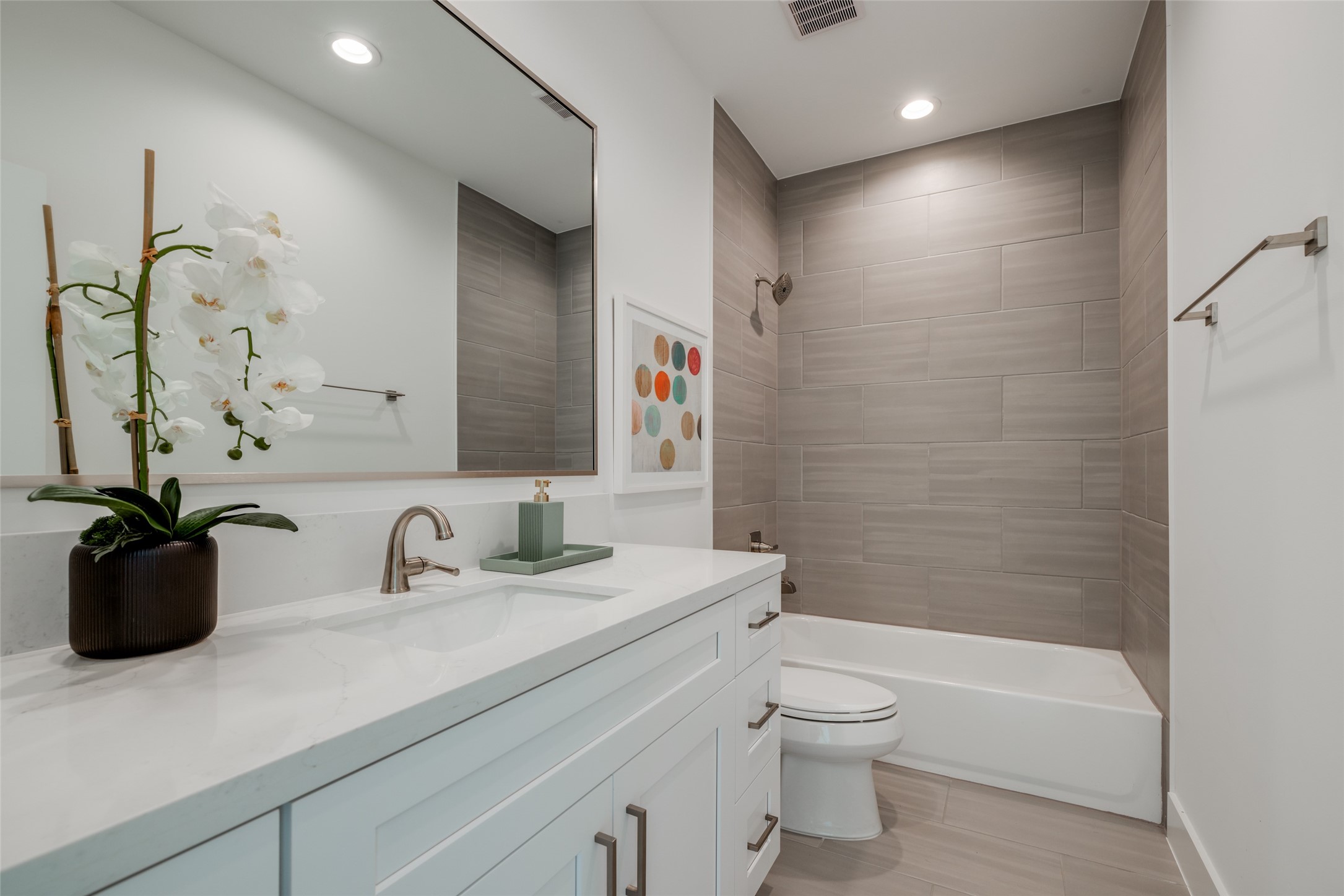 2327 Richton Street Houston, TX 77098 - Photo 45 of 47 a bathroom with a sink a toilet and shower
