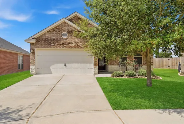 a front view of a house with an outdoor space