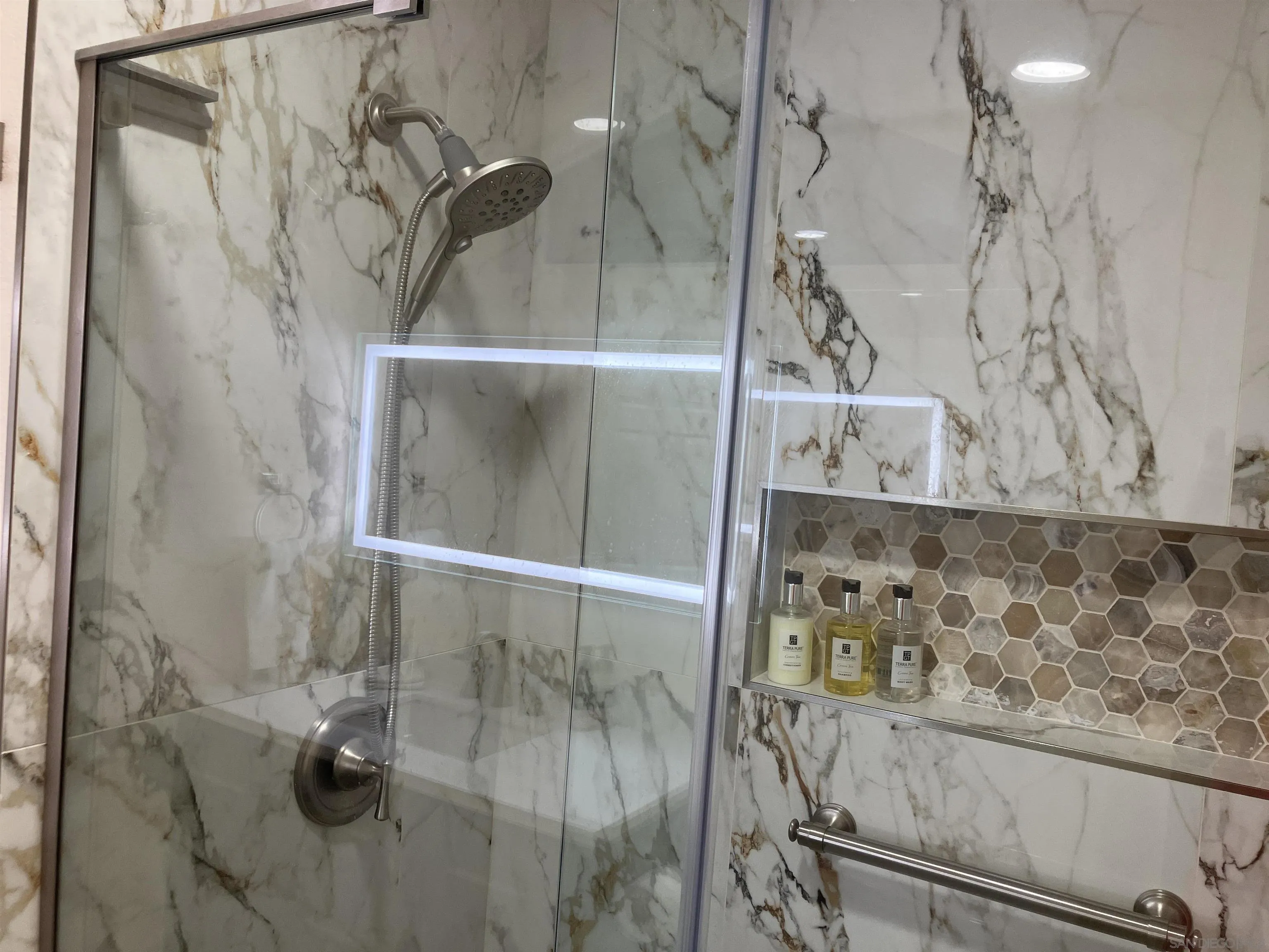 8418 Hovenweep Court San Diego, CA 92129 - Photo 21 of 29 a bathroom with a shower