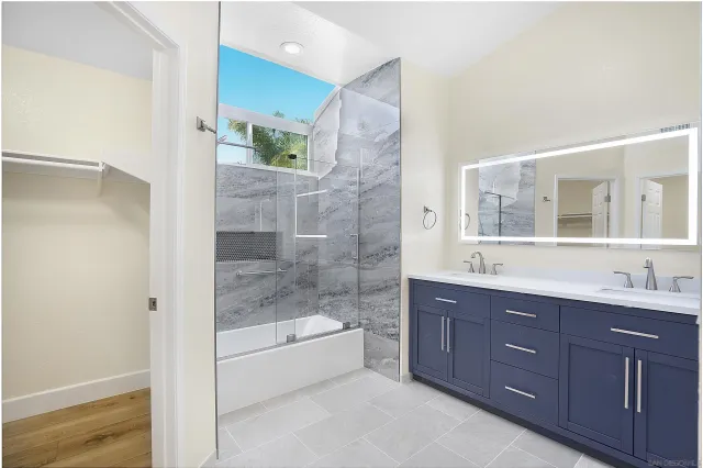 a view of a patio with table and chairs and potted plants