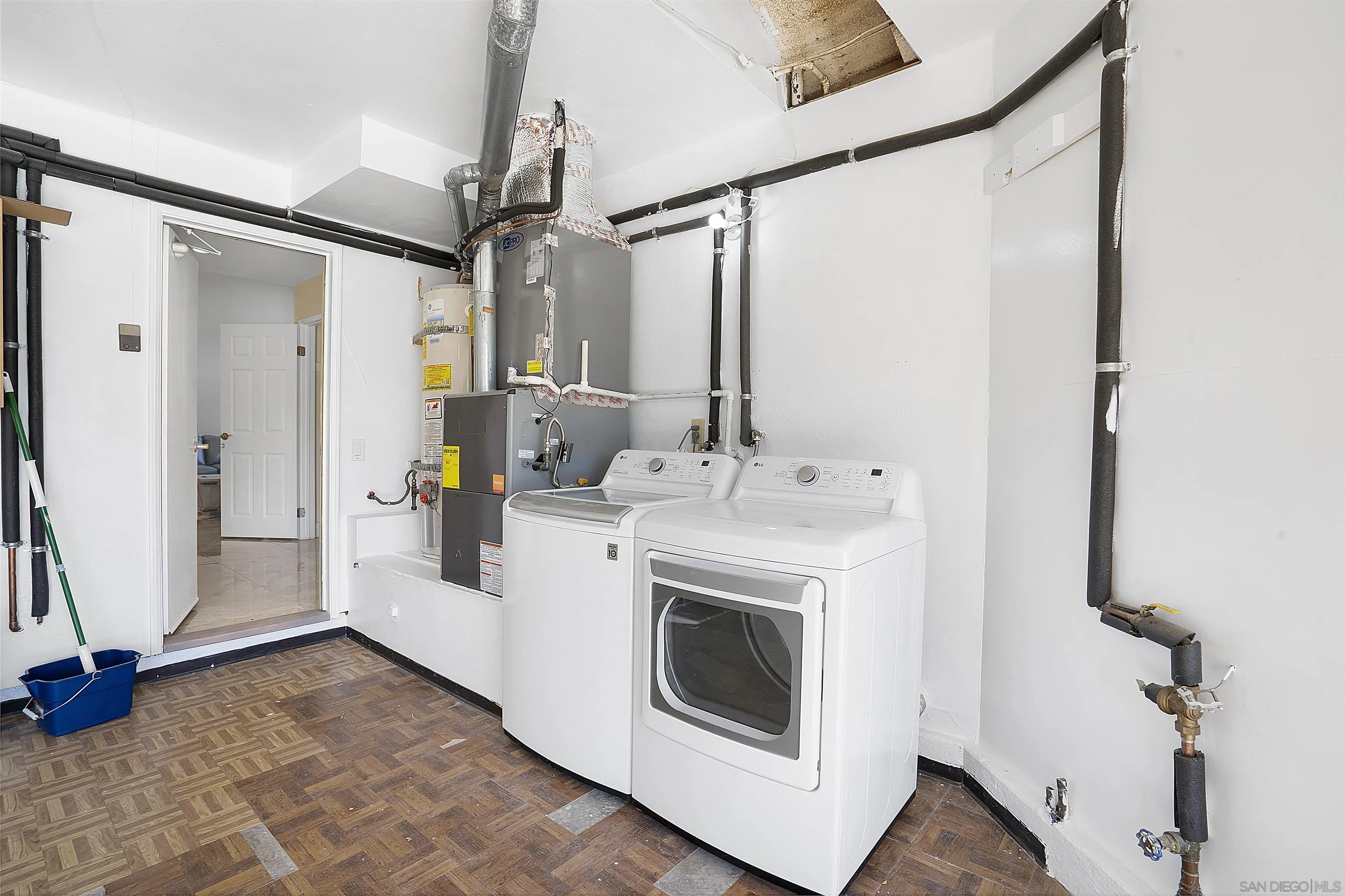 8418 Hovenweep Court San Diego, CA 92129 - Photo 23 of 29 a view of bathroom with a sink and mirror