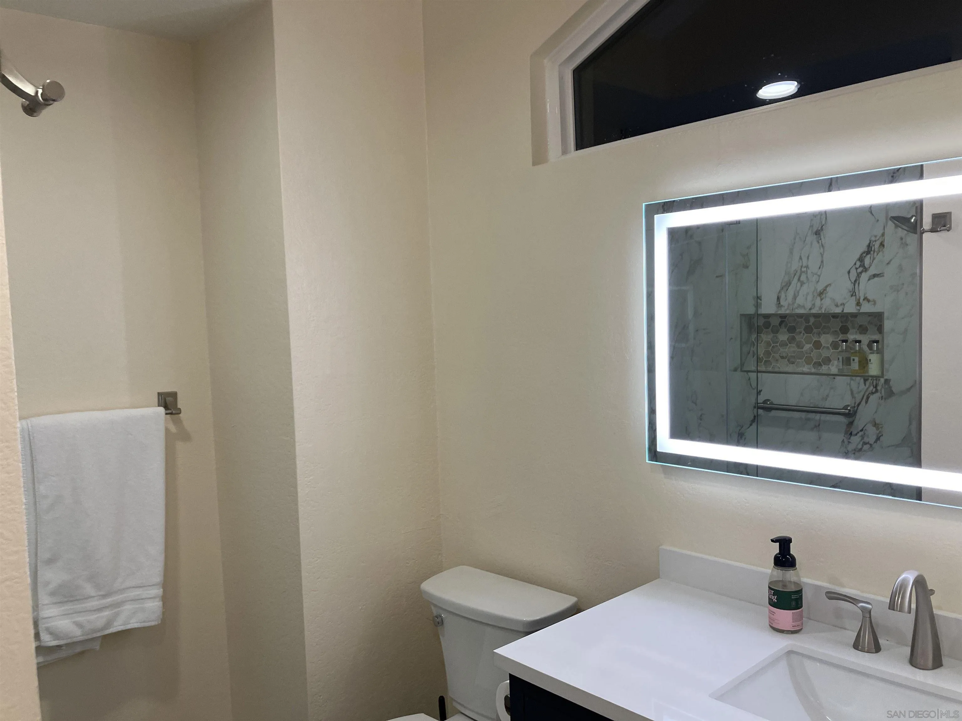 8418 Hovenweep Court San Diego, CA 92129 - Photo 26 of 29 a bathroom with a sink and a toilet