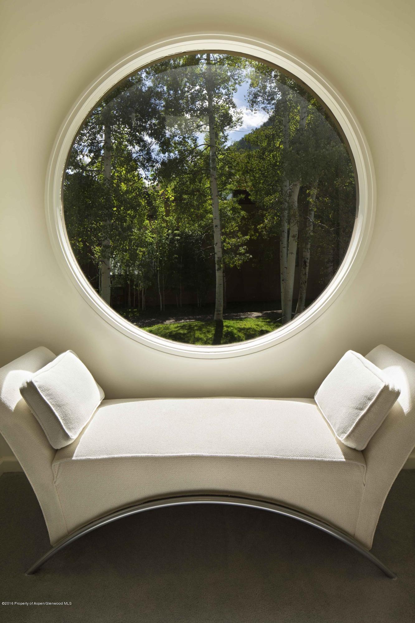 625 South W End Street, Unit 15 Aspen, CO 81611 - Photo 11 of 14 a living room with a couch