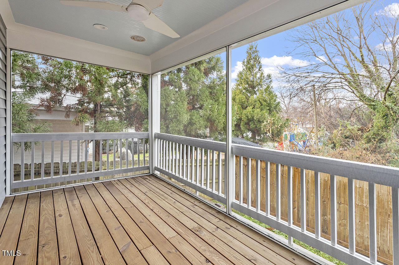 520 South Bloodworth Street Raleigh, NC 27601 - Photo 4 of 37 a view of a balcony with wooden floor