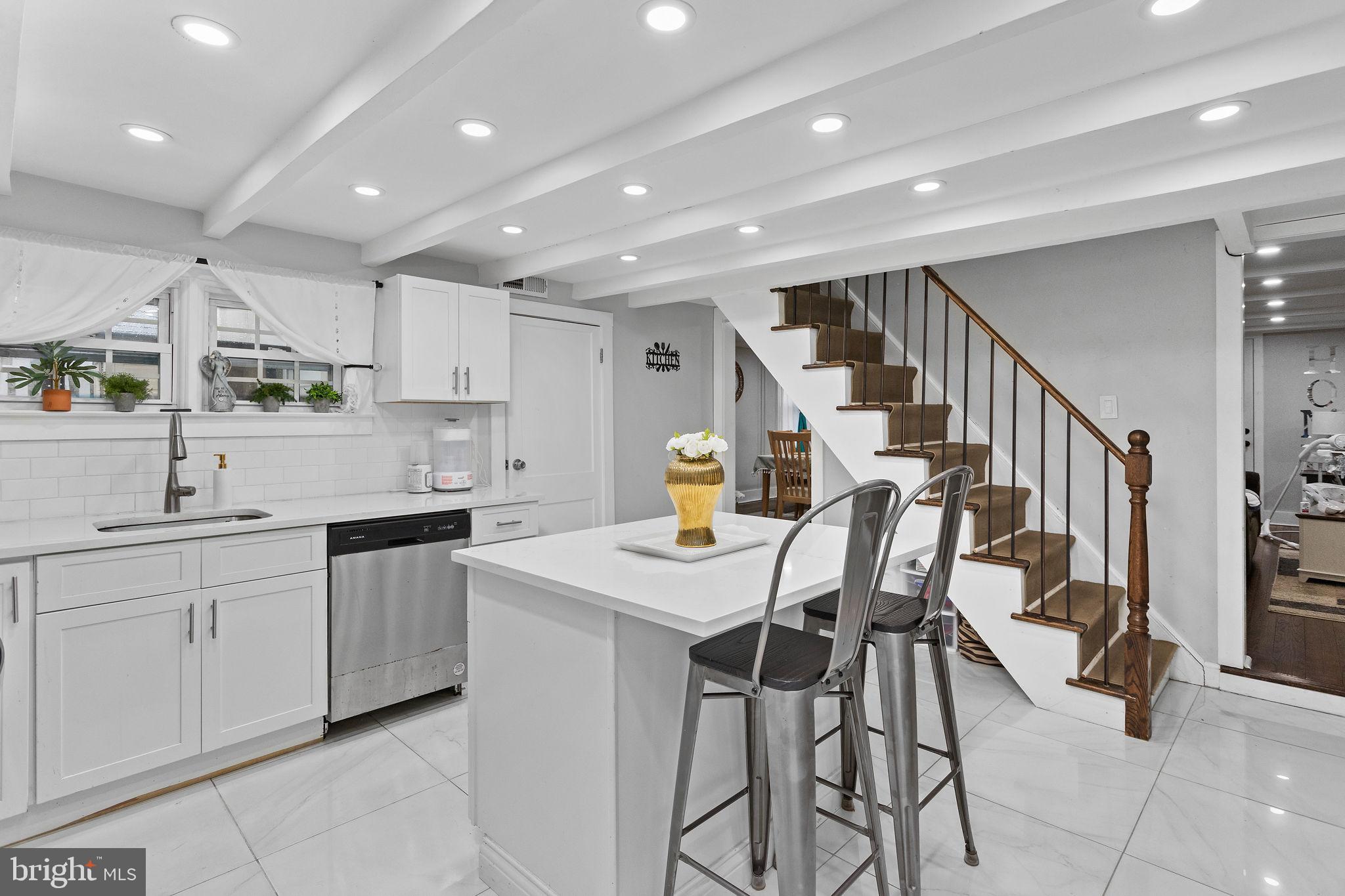 11 Main Street Englishtown, NJ 07726 - Photo 4 of 29 Modern kitchen with elegant staircase.
