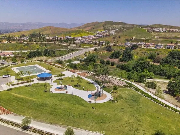 a view of a city with mountains in the background