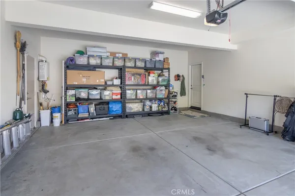 a room with furniture and a book shelf