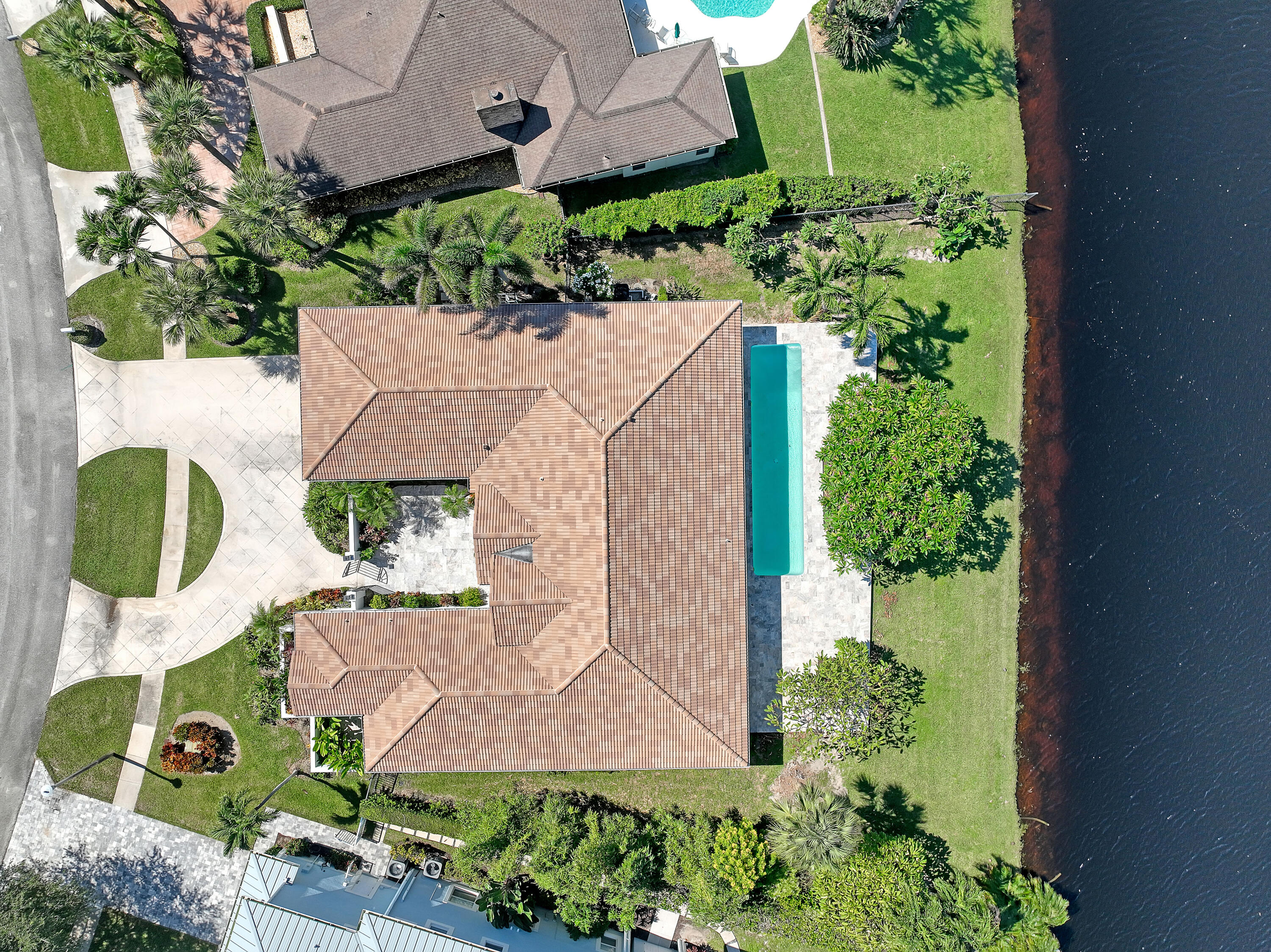 161 Apollo Circle Jupiter, FL 33477 - Photo 12 of 60 an aerial view of a house with a yard